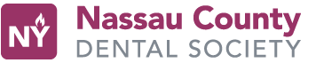 The image shows a logo with text that reads  NASAU COUNTY DENTAL SOCIETY,  accompanied by a graphic of a toothbrush and a crown, suggesting an association with dental care and possibly a professional organization.